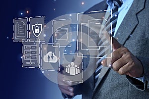 Businessman using a computer touch visual screen to document management concept, documentation database and digital file storage