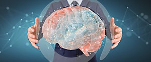 Businessman using digital 3D projection of a human brain 3D rendering