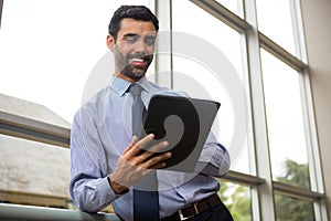 Businessman using digital tablet