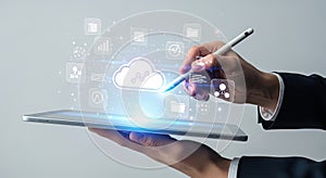 Businessman using digital tablet with cloud computing technology and data storage