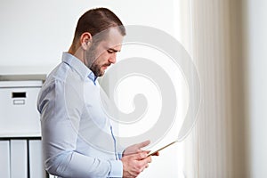 Businessman using digital tablet