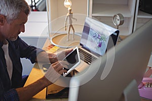 businessman using digital tablet at creative office