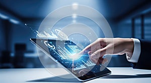 Businessman using a digital tablet with a futuristic holographic user interface for data analysis