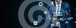 Businessman using digital tablet with futuristic machine learning interface icons and AI symbols on dark background with copy photo