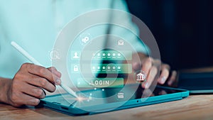 A businessman using a digital tablet with a virtual login screen, representing cybersecurity, password protection, online