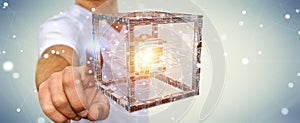 Businessman using futuristic cube textured object 3D rendering