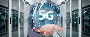 Businessman using 5G network interface 3D rendering