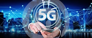 Businessman using 5G network interface 3D rendering