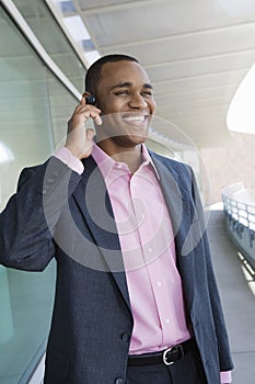 Businessman Using Hands Free Device