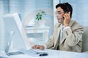 Businessman using headset