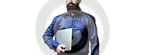 Businessman using his laptop, pc. Holding laptop computer. Serious handsome bearded man worker laptop. Bearded male