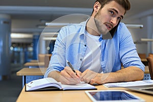 Businessman using his mobile phone in the office