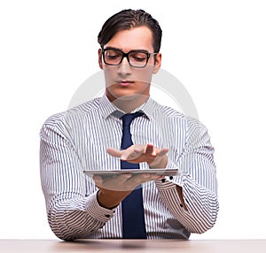 Businessman using his tablet computer isolated on white