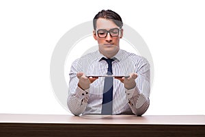 The businessman using his tablet computer isolated on white