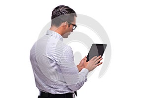 The businessman using his tablet computer isolated on white