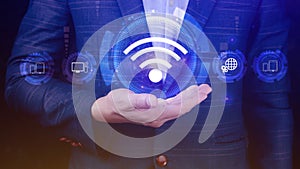 Businessman using holding with wifi icon. Social network business communication concept, Wifi wireless concept free network