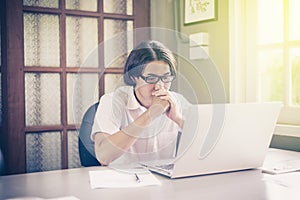 Businessman using ideas while working with labtop