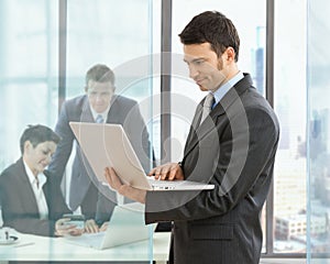 Businessman using laptop