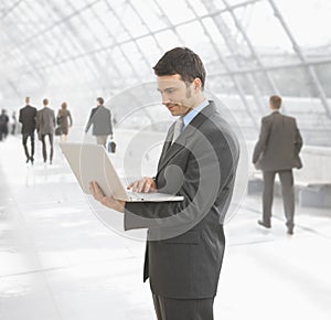 Businessman using laptop computer