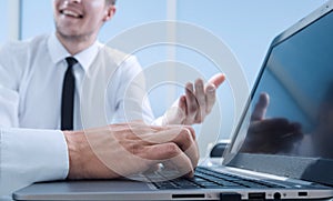 Businessman using laptop computer