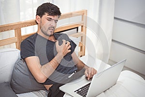 Businessman using laptop computer overnight cause heart attack failure symptom. Healthcare and medical wellness of overworked