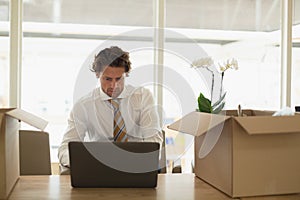 Businessman using laptop in the conference room