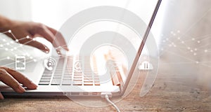 Businessman using laptop on global structure networking.