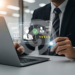 Businessman using laptop with virtual user interface for human resources