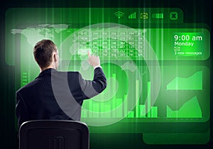 Businessman using media interface