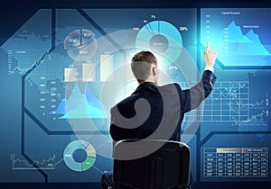 Businessman using media interface