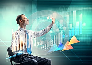 Businessman using media interface