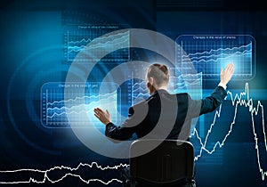 Businessman using media interface