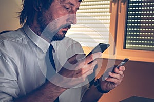 Businessman using mobile banking services app to purchase online