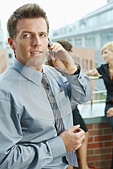 Businessman using mobile phone