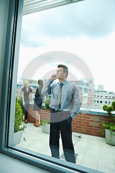 Businessman using mobile phone