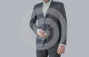 Businessman using mobile phone app texting