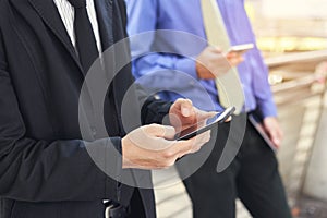 Businessman using mobile smart phone
