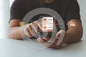 Businessman using mobile smart phone and touching on document icon for tick mark on virtual document