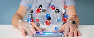 Businessman using modern molecule structure 3D rendering