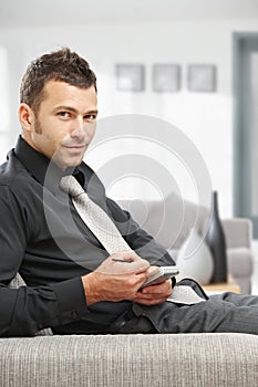 Businessman using palmtop