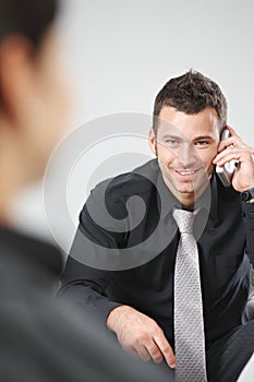 Businessman using palmtop