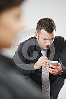 Businessman using palmtop