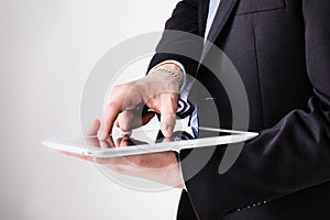 Businessman using pinch zoom