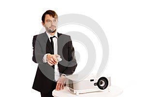 Businessman using a projector for a presentation