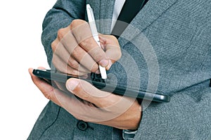 Businessman using a stylus pen in his tablet