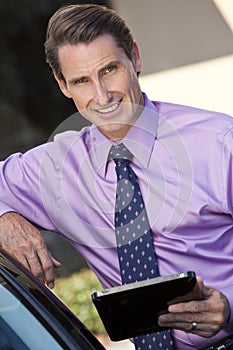 Businessman Using Tablet Computer or iPad