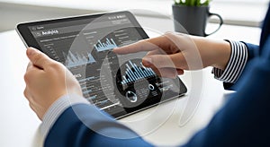Businessman Using Tablet For Data Analysis