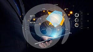 Businessman using tablet with futuristic data visualization and analytics interface, showcasing modern technology and