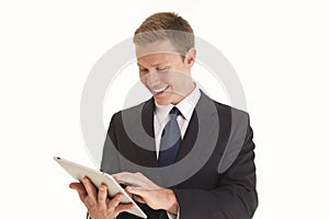 Businessman using touch screen tablet computer