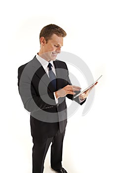 Businessman using touch screen tablet computer